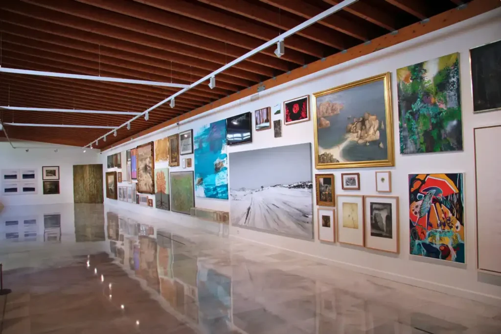 Inside a modern art gallery at MuCAC