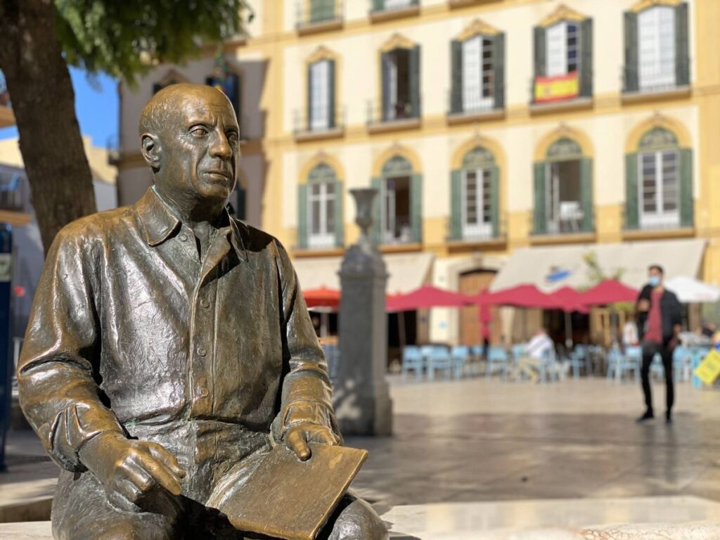 Sculpture of Picasso outside the Picasso Birthplace Museum