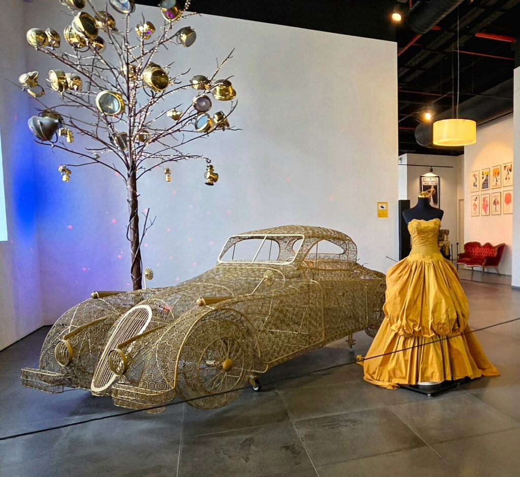 Car and couture displays side by side