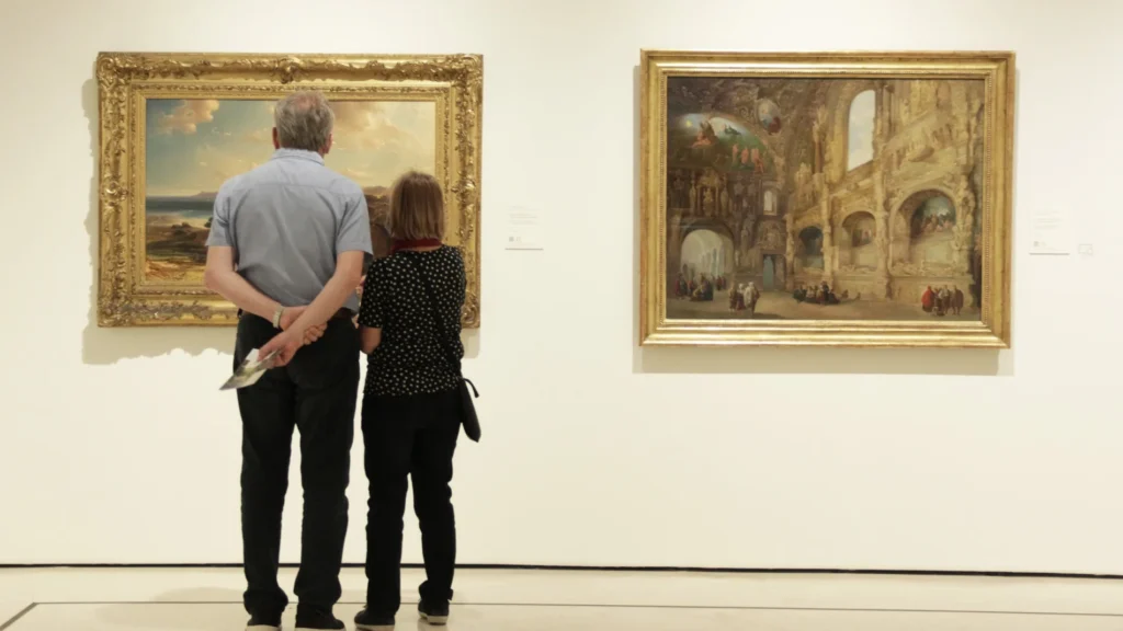 Man and woman looking at art in the Carmen Thyssen Museum