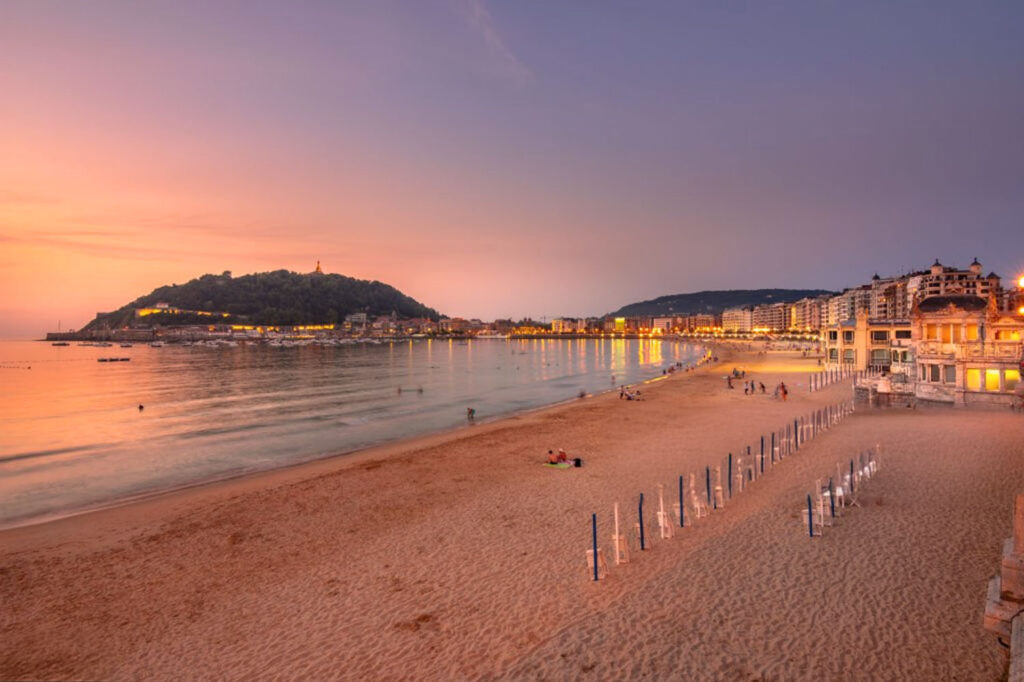 Playa de Ondarreta beach at sunset